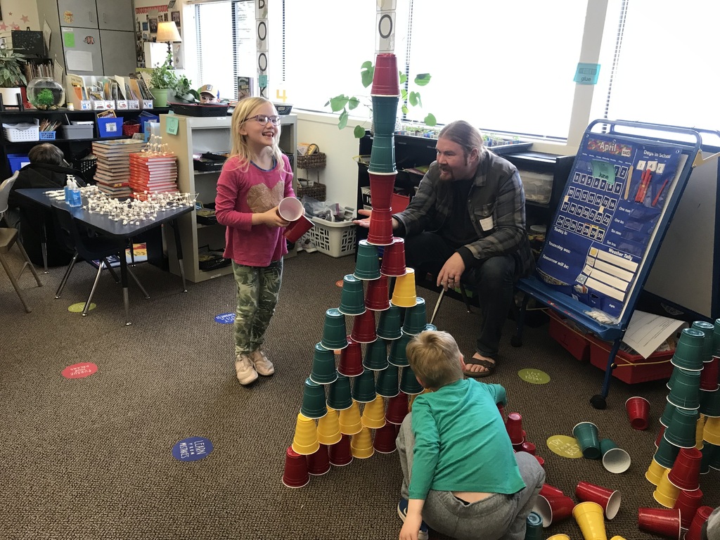 children stacking cups
