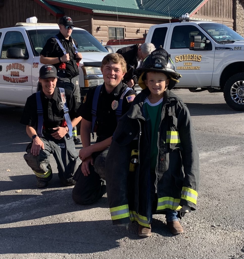 kid dressed as fireman