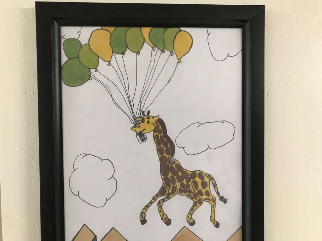 flying giraffe with balloons