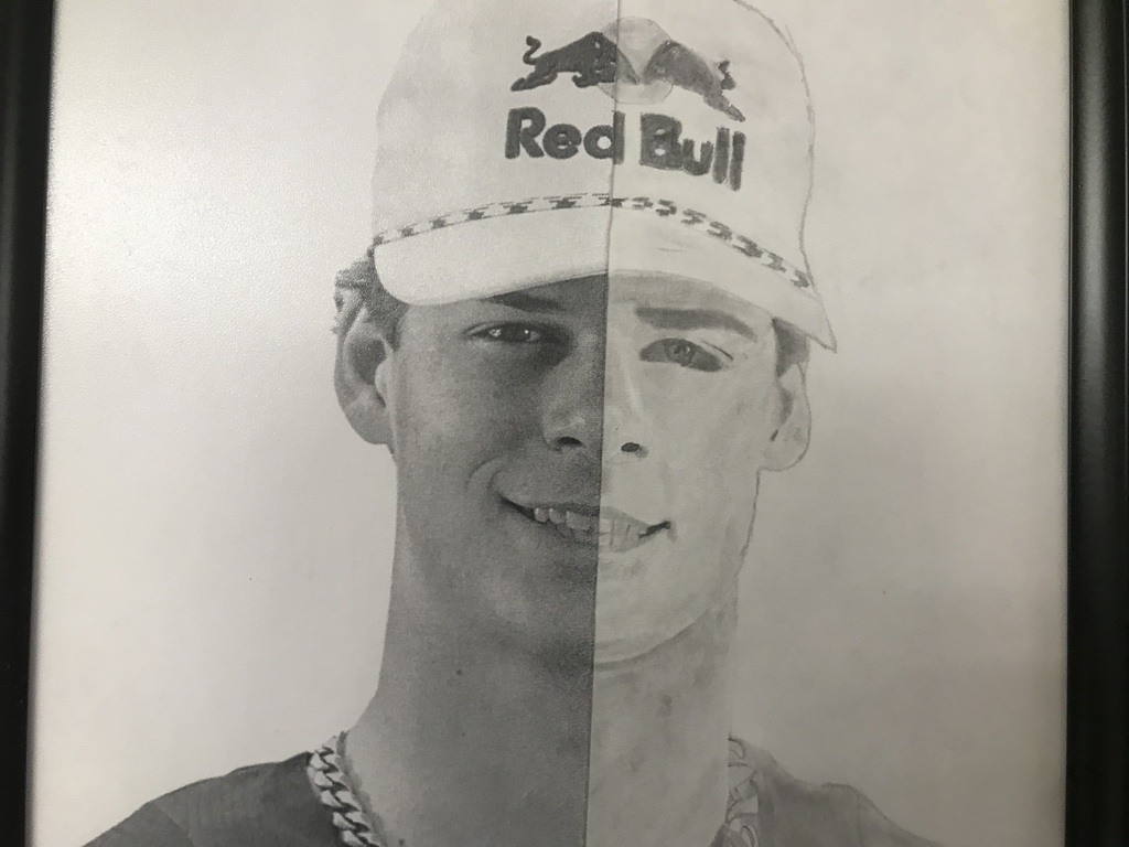man with Red Bull cap